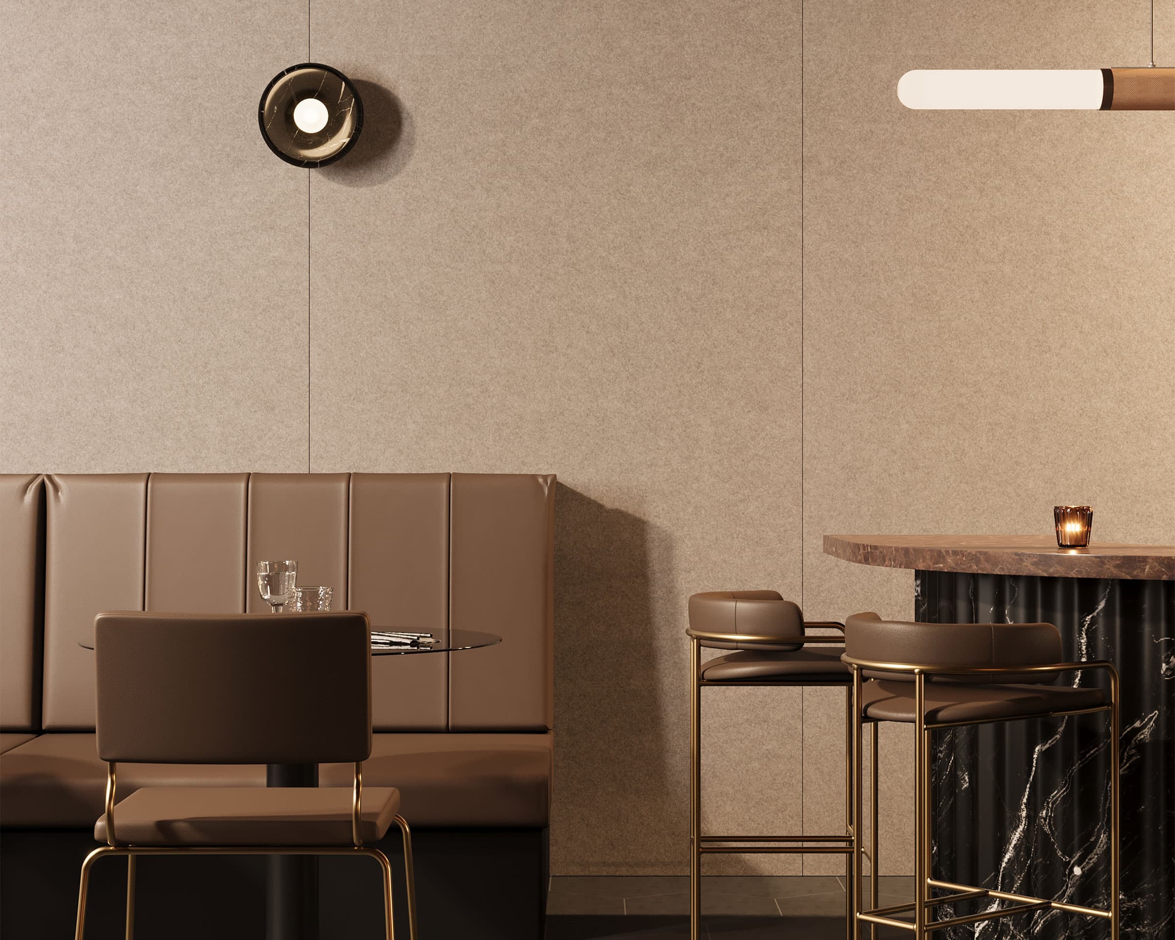 A modern, minimalist dining area featuring a brown leather booth with a round black table and chairs. Adjacent to the booth is a marble-topped bar with gold-accented bar stools. The room has beige acoustic felt wall panels, a circular wall light, and a sleek linear ceiling light.