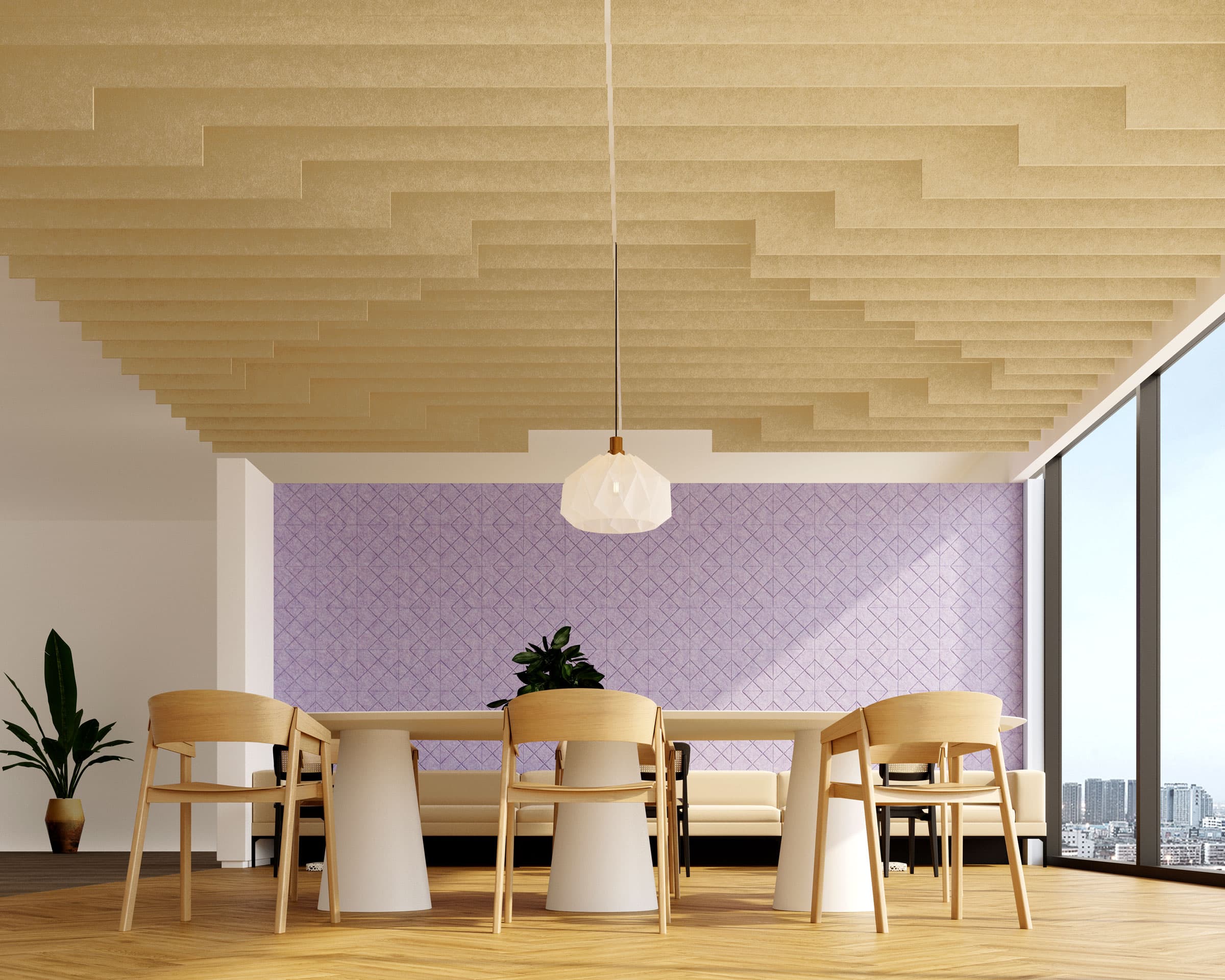 A modern dining room with a long table set with six wooden chairs, a white hanging pendant light, and geometric acoustic felt ceiling baffles. The back wall is decorated with a purple patterned design. Large windows offer a view of the city skyline.