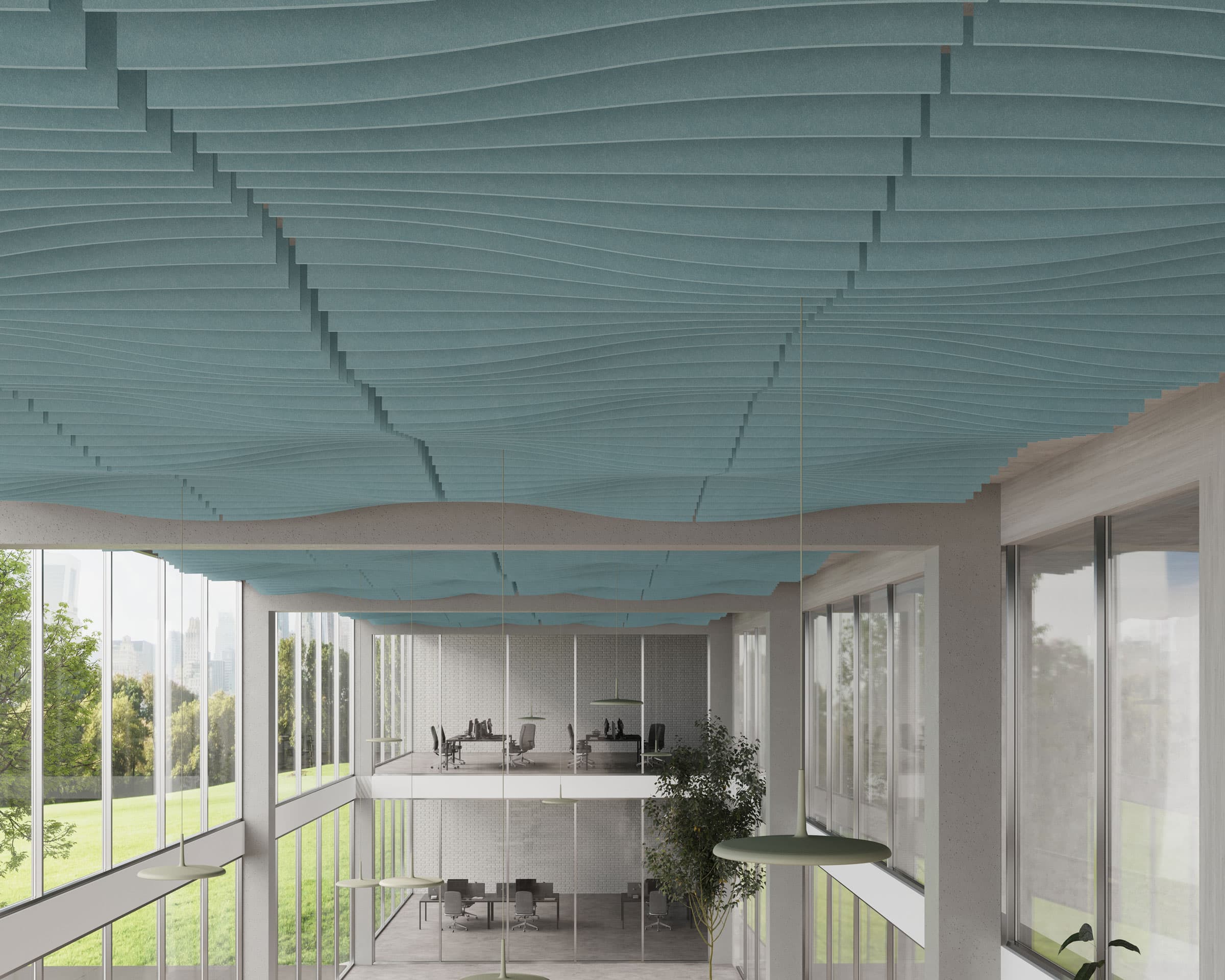 A modern office interior with large windows and an undulating blue acoustic felt ceiling baffle design. The space features open seating, desks, and an indoor tree. The windows reveal a green outdoor landscape with trees and a distant city skyline.