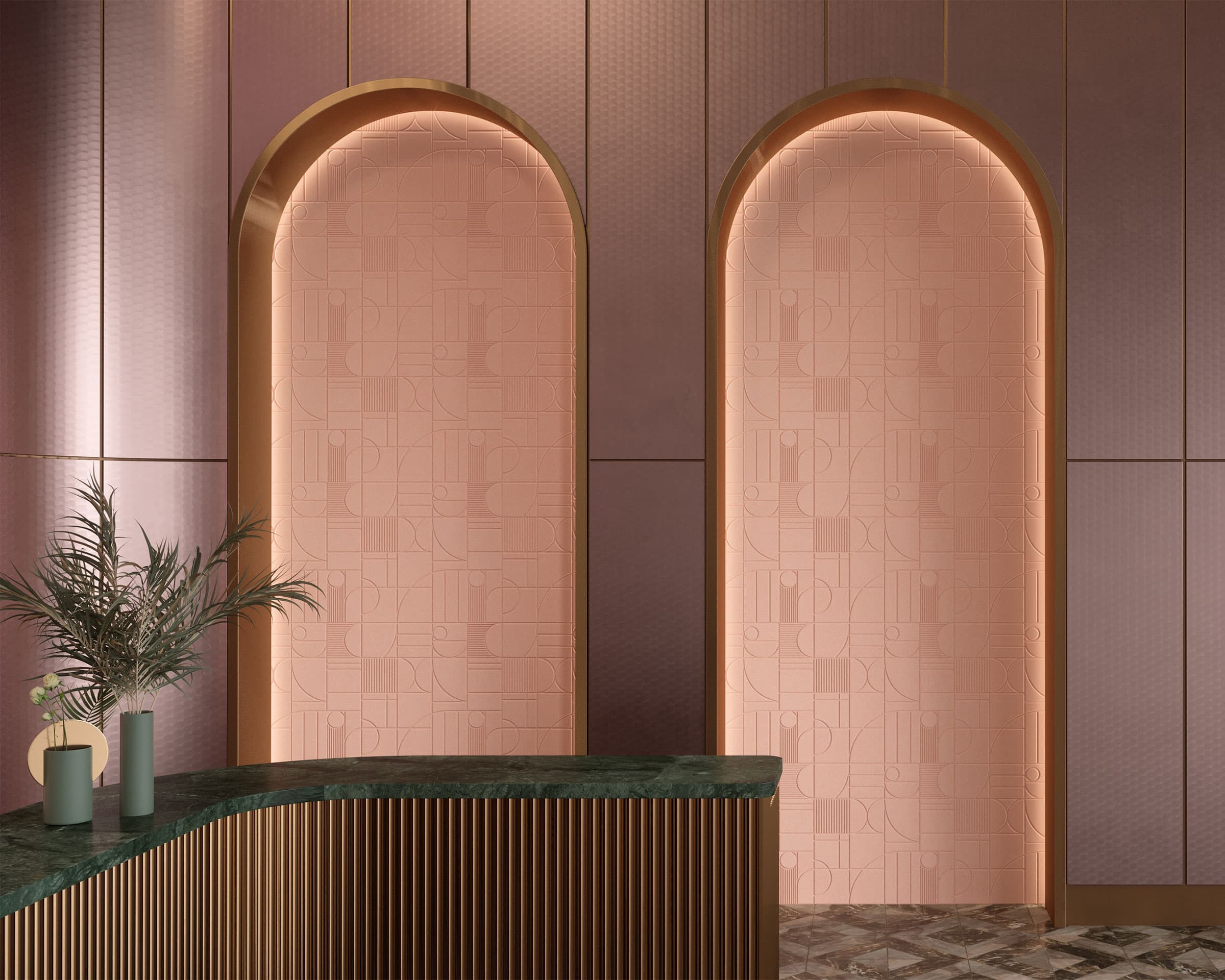 A modern interior features two large, illuminated archways with geometric patterns on rose-colored acoustic felt walls. A green marble counter with ribbed wood detailing stands in the foreground, adorned with minimalist vases and a plant arrangement.