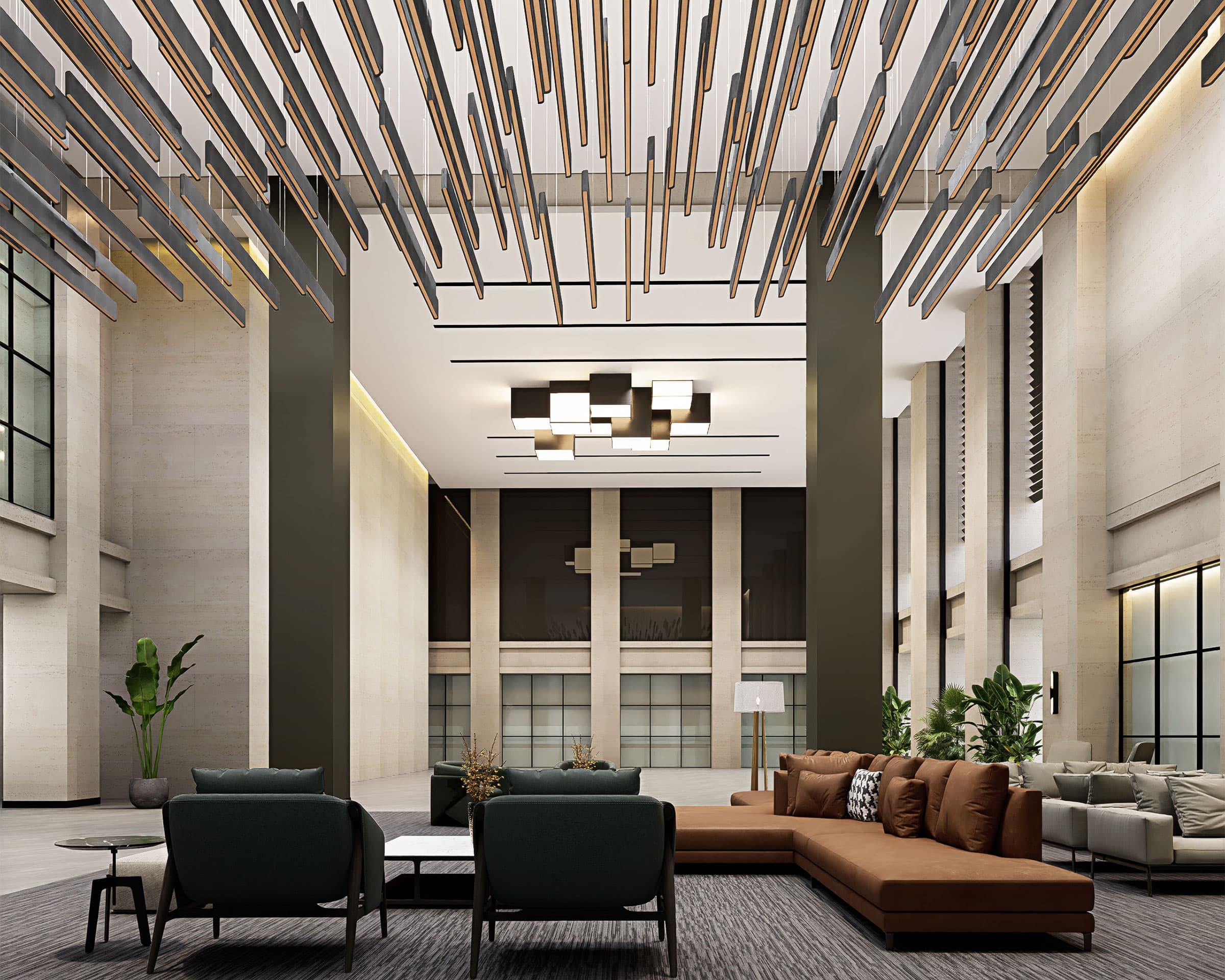 A modern, spacious lobby with tall ceilings and acoustic felt ceiling baffles. It features geometric hanging light fixtures and a seating area with a large brown sectional sofa, two dark green chairs, and side tables. Tall windows and indoor plants add to the contemporary ambiance.