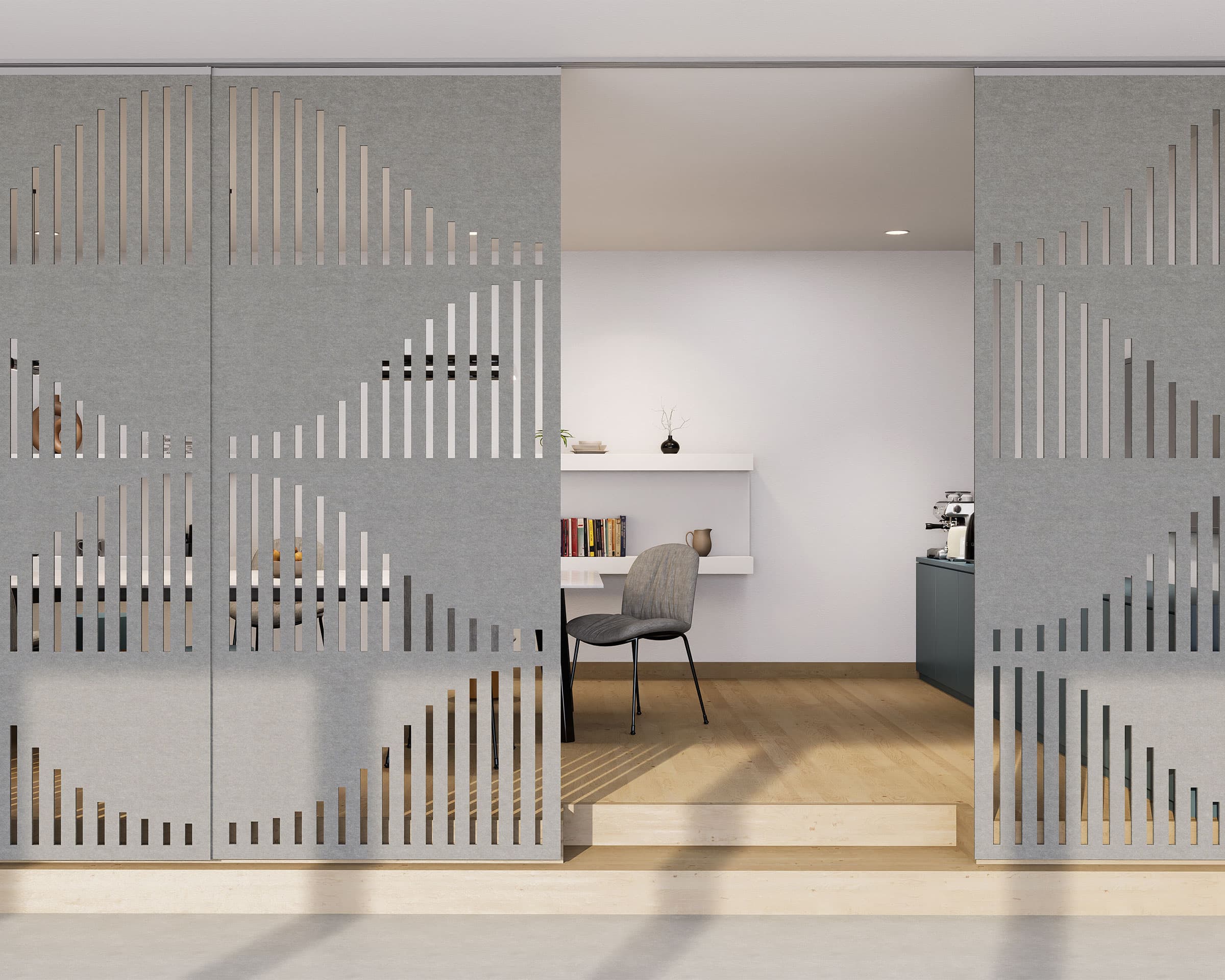 A modern office space with a minimalist design features two perforated, grey acoustic felt sliding panels partially open to reveal a room with a wooden floor, white walls, a desk, shelves with books and decor, and a grey office chair. Soft lighting highlights the clean lines and organized setup.