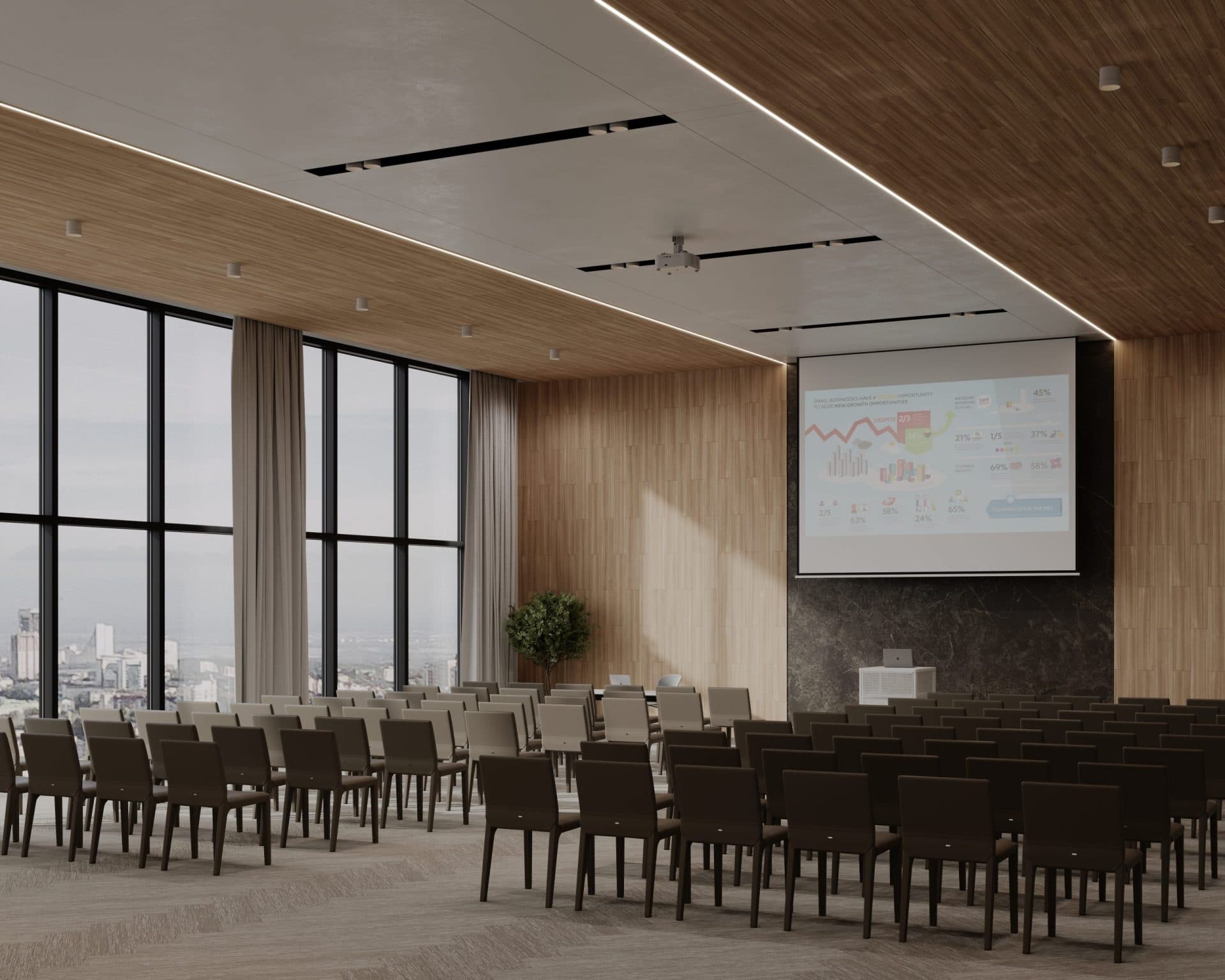 A modern conference room with rows of brown chairs facing a projector screen displaying a colorful presentation. The room features floor-to-ceiling windows with city views, a wooden accent wall, and acoustic felt ceiling planks. There is a green plant in the corner and recessed ceiling lights.