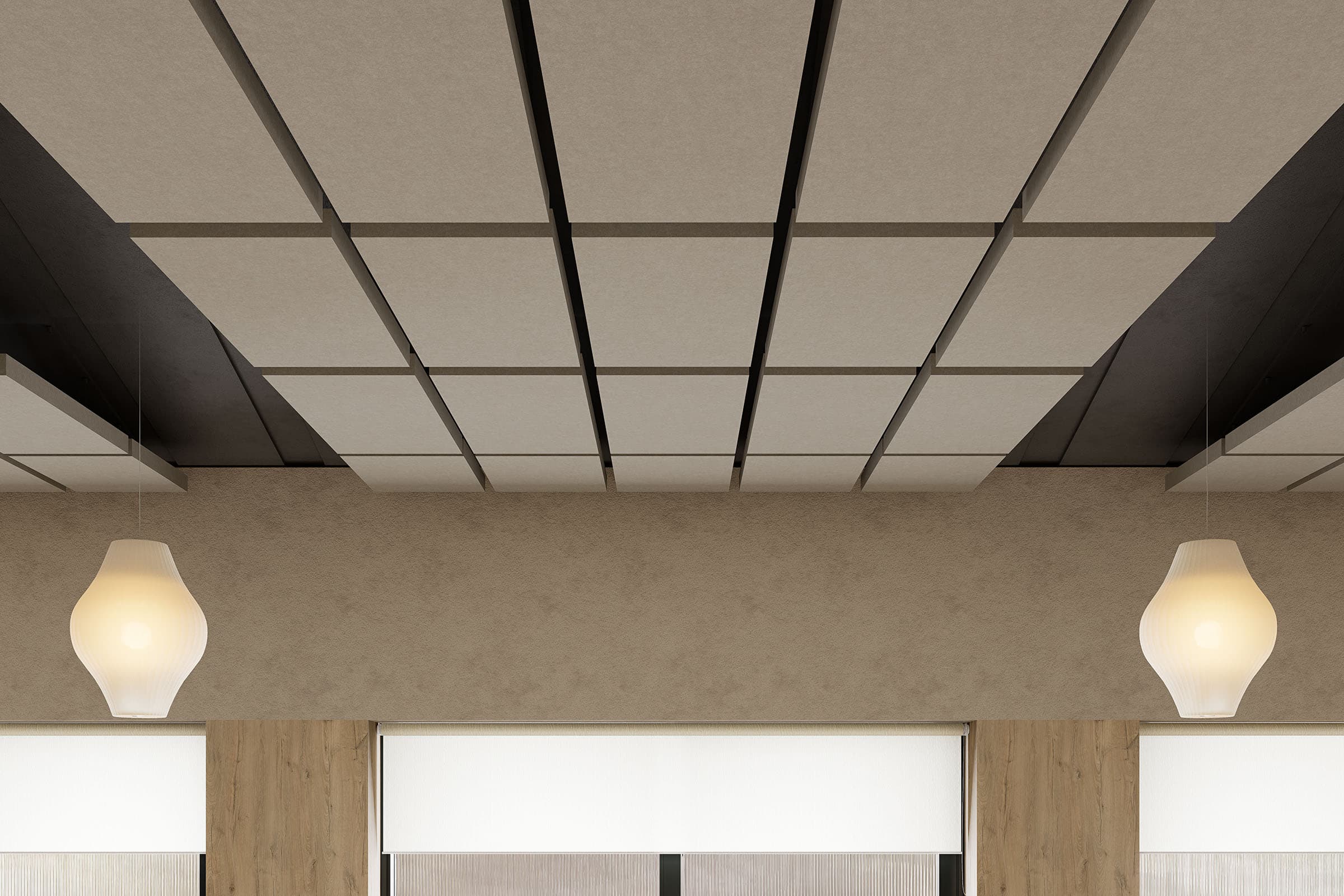 A modern ceiling with a grid of rectangular acoustic felt clouds and two pendant lights with white shades. The wall below features wooden elements and large windows with closed roller blinds.