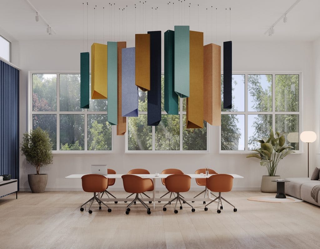 Modern and spacious living room with eclectic hanging ceiling clouds, large windows, and a cozy seating area featuring pendant-shaped ceiling clouds.