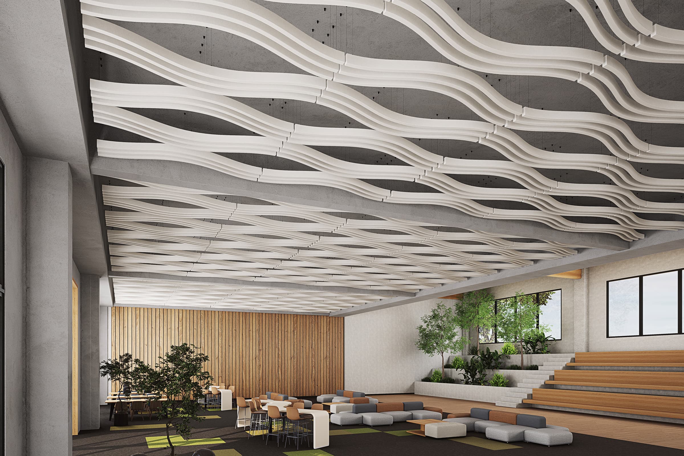 A modern open office space with billow-patterned acoustic ceiling baffles, wooden wall accents, and a mix of potted plants. Seating includes modular cubes and an amphitheater-style staircase. There are desks and chairs for working and relaxing areas throughout.