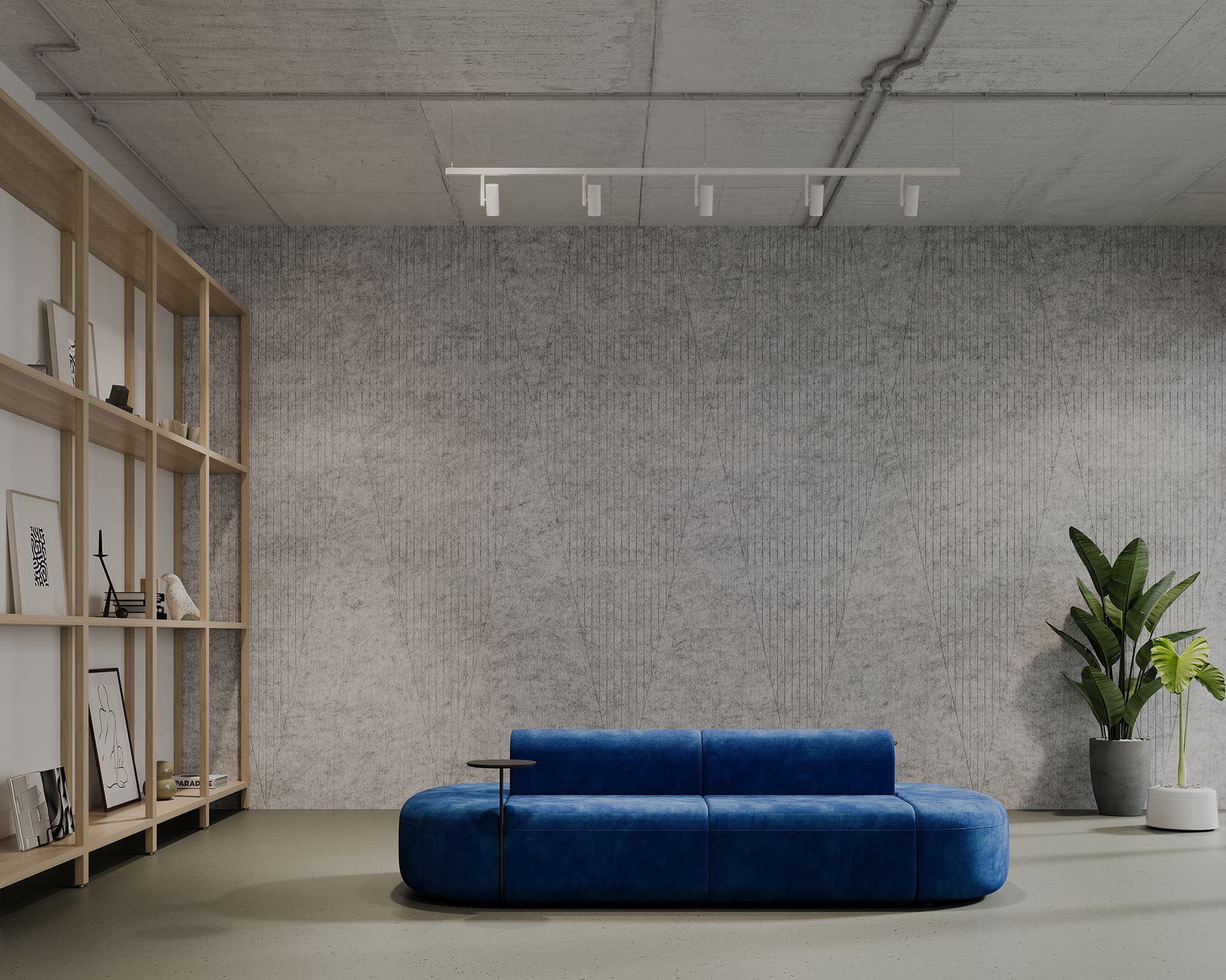 A modern minimalist living room with a concrete ceiling and acoustic felt walls. The space features a sleek blue couch, a large potted plant, and wooden shelving on the left display books and decor items. Overhead track lighting illuminates the room.