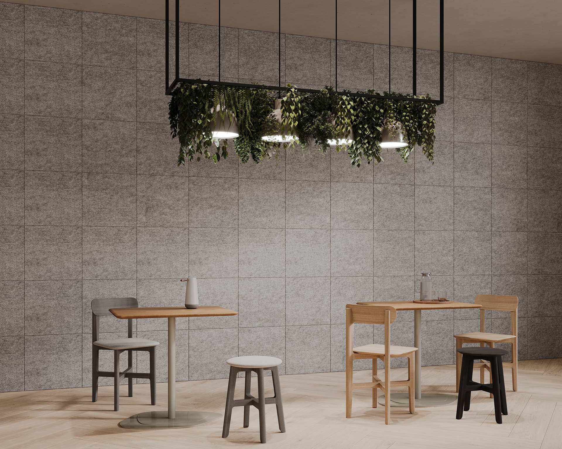 A modern minimalist dining area with light gray acoustic tiled walls, three wooden tables each surrounded by various wooden chairs and stools, and a green plant fixture hanging from black metal frames with integrated lighting above each table.