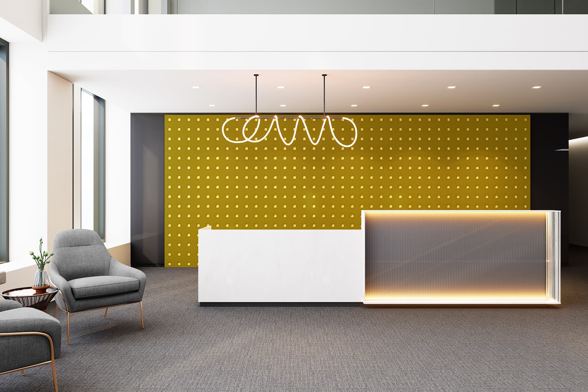 A modern office lobby with a sleek, minimalistic reception area. It has a white marble reception desk on the right and a gray armchair with a small table on the left. The back acoustic felt wall has a yellow with white square pattern, and stylish linear hanging lights are on the ceiling.