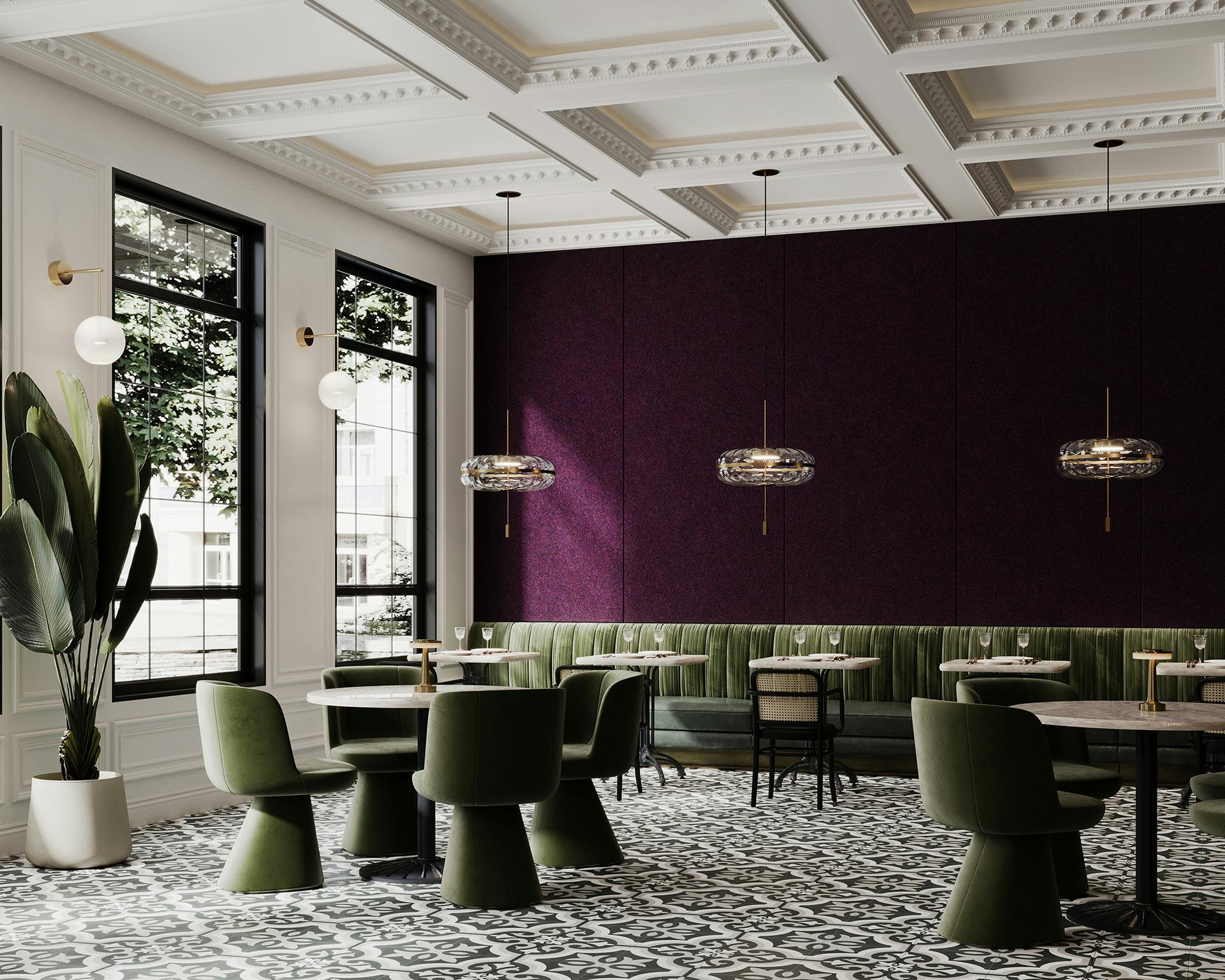 A chic and modern restaurant interior. It features green velvet chairs and an elegant green banquette seating against a dark shiraz acoustic felt paneled wall. The space is illuminated by hanging pendant lights and natural light streaming through large windows. The floor showcases a stylish black and white patterned tile.