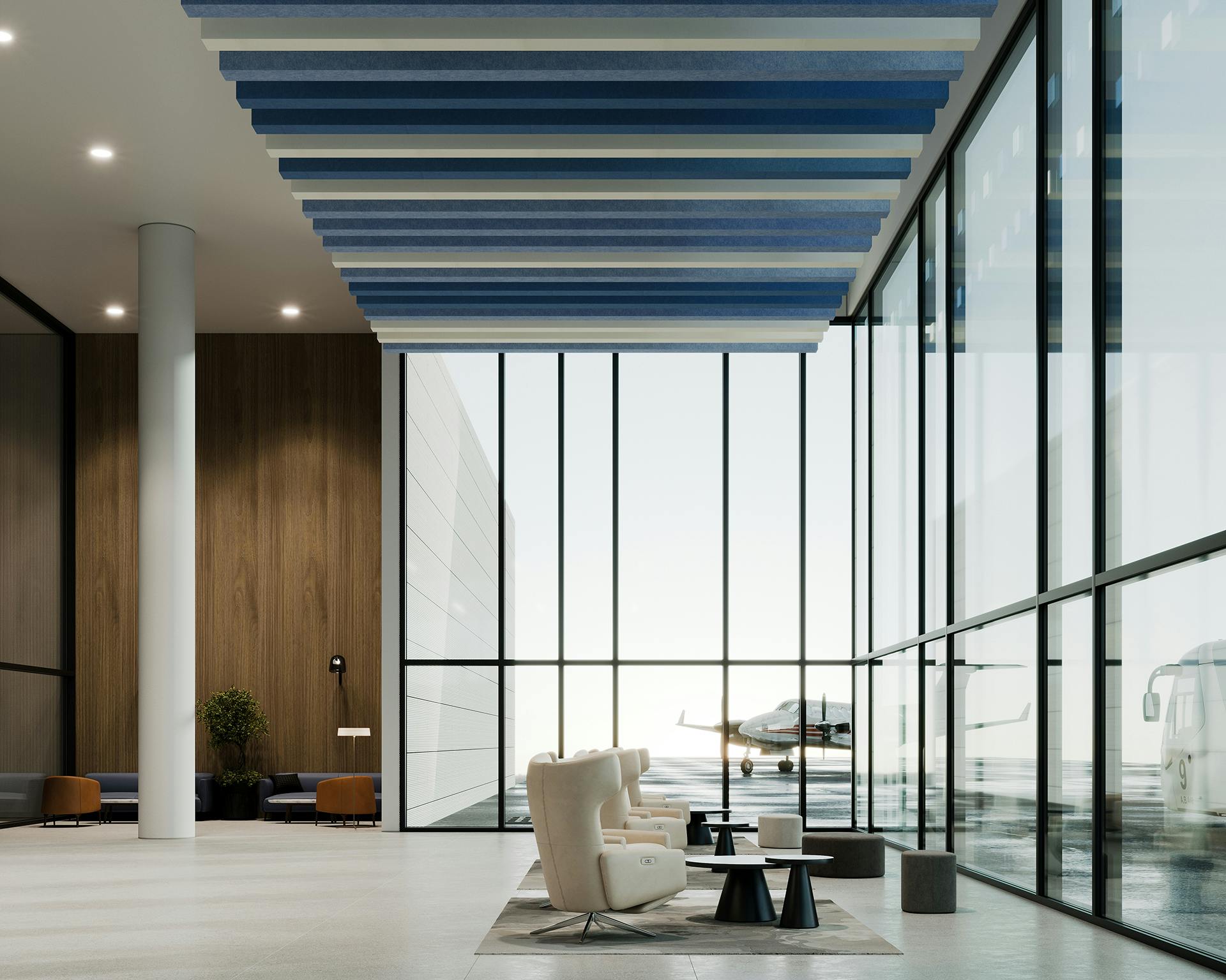 A modern airport lounge with floor-to-ceiling windows overlooking a parked airplane. The lounge features comfortable beige armchairs, small black tables, wooden wall panels, and a decorative blue and white acoustic ceiling baffle installation.