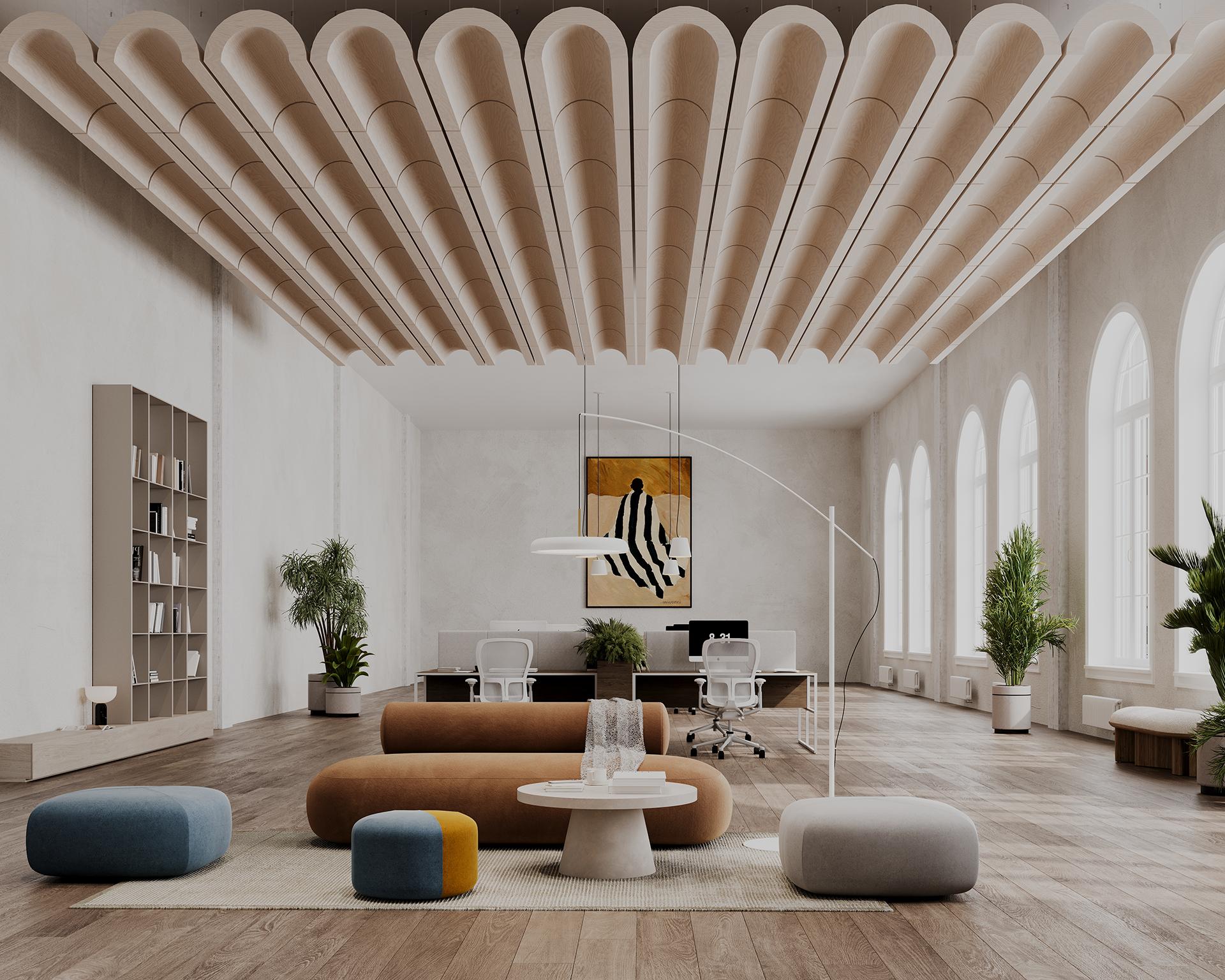 A spacious, contemporary office features curved ceiling clouds, large arched windows, and modern furniture. Central seating includes cushioned stools and a round table, while desks and chairs occupy the background alongside indoor plants and a vibrant abstract painting.