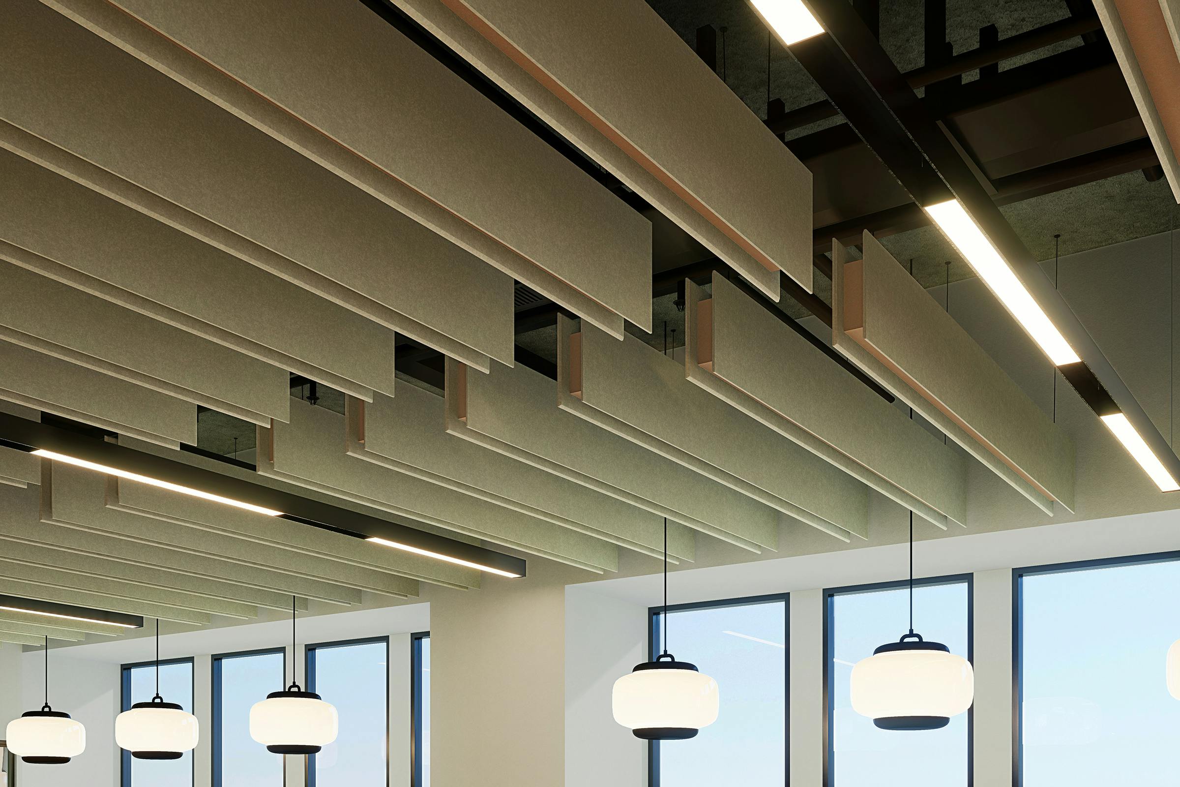 Modern office space with stylish hanging pendant lamps and sleek, baffle-layered panel ceiling design featuring recessed lighting for improved sound quality.
