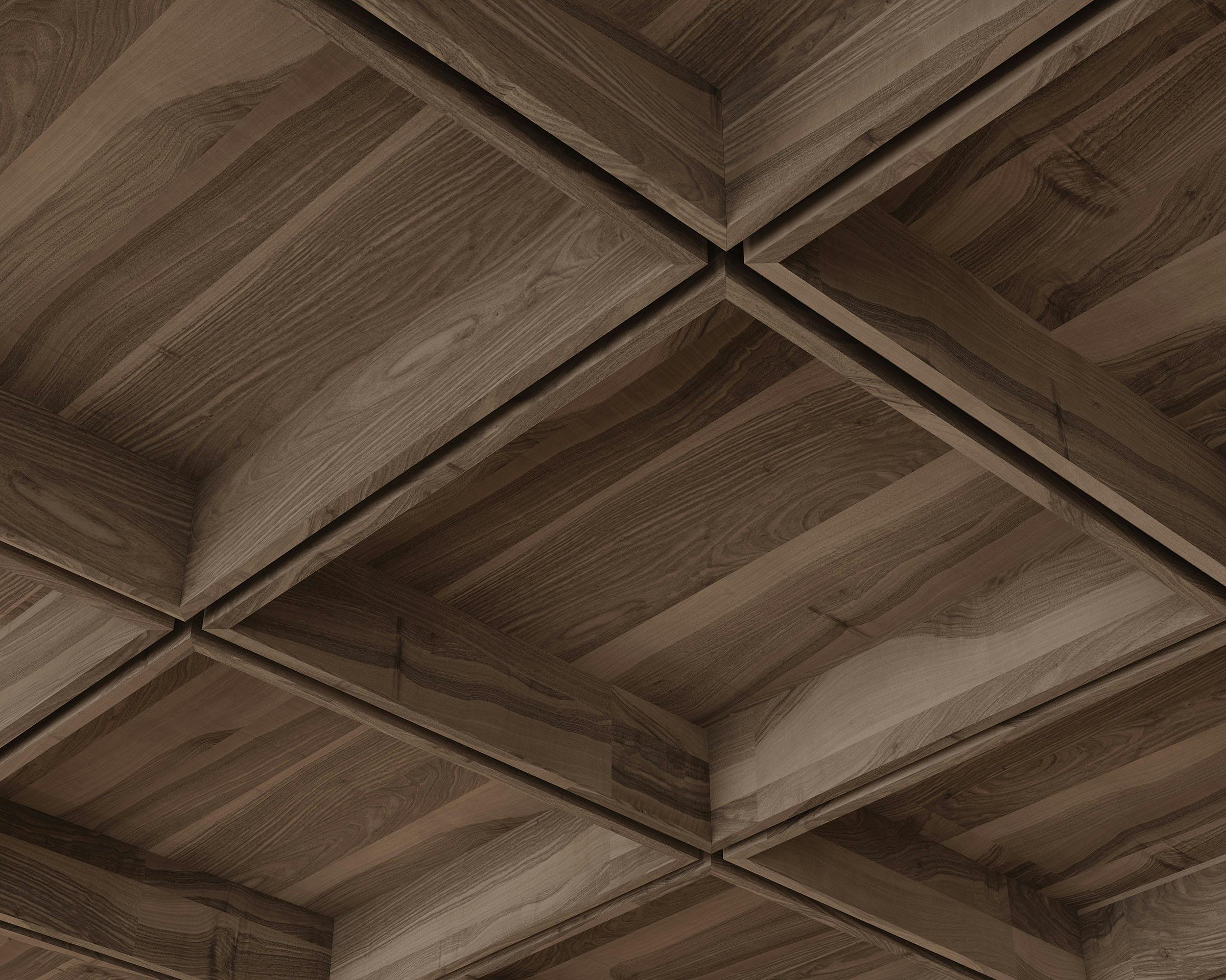 Close-up view of a wooden waffle pattern on a ceiling, showcasing the natural grain and rich color variations in the wood, reminiscent of a finely crafted acoustic guitar.